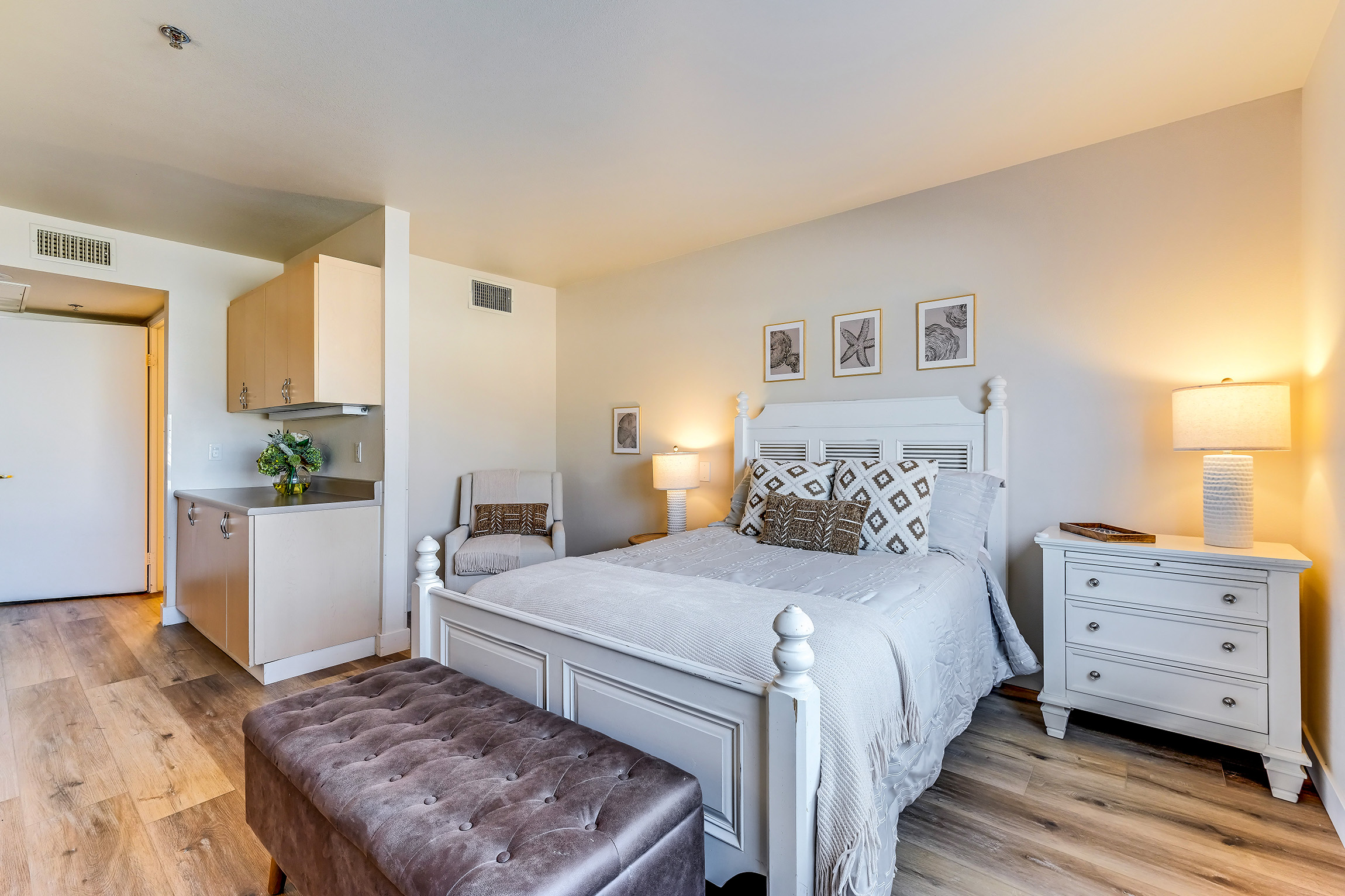 Model bedroom with queen bed
